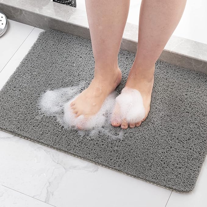 Système de drainage du tapis de bain antidérapant