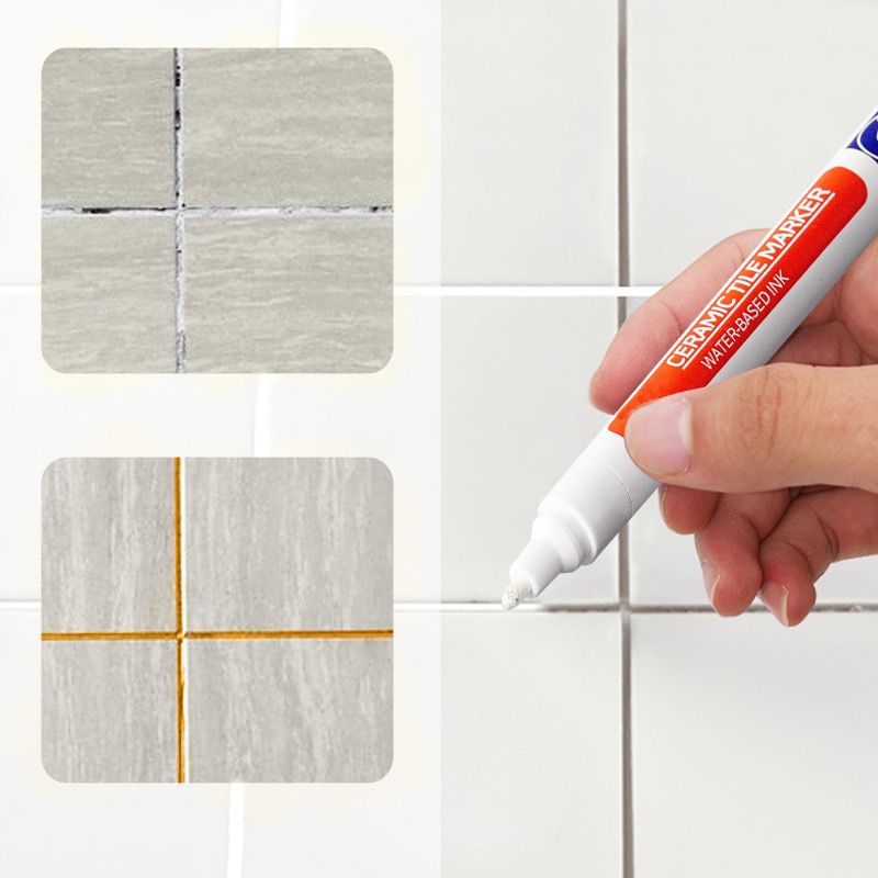 Stylo de joint imperméable posé sur un carrelage blanc