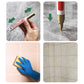 Main appliquant le stylo sur un joint de cuisine