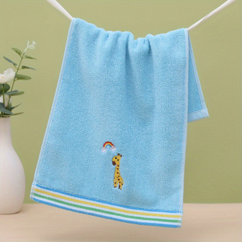 Gros plan sur broderie lion sur serviette douce