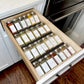 Quatre organisateurs en acrylique transparent empilés