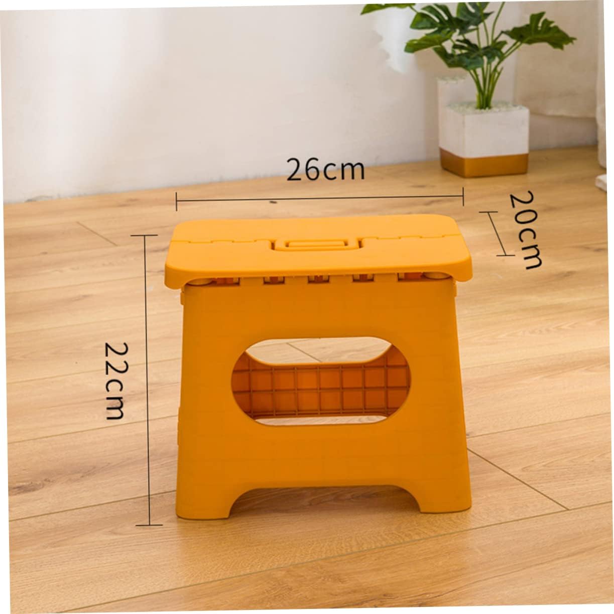 Tabouret pliant montrant sa stabilité sur sol lisse