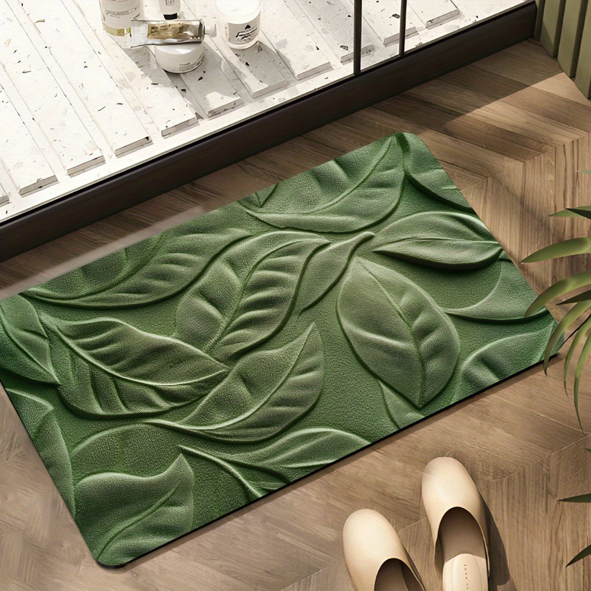 Tapis de bain avec motif de feuilles vertes sur sol blanc