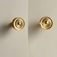 Bouton de meuble en laiton or brossé sur fond blanc