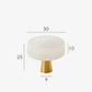 Bouton de meuble rond en laiton effet marbre perle