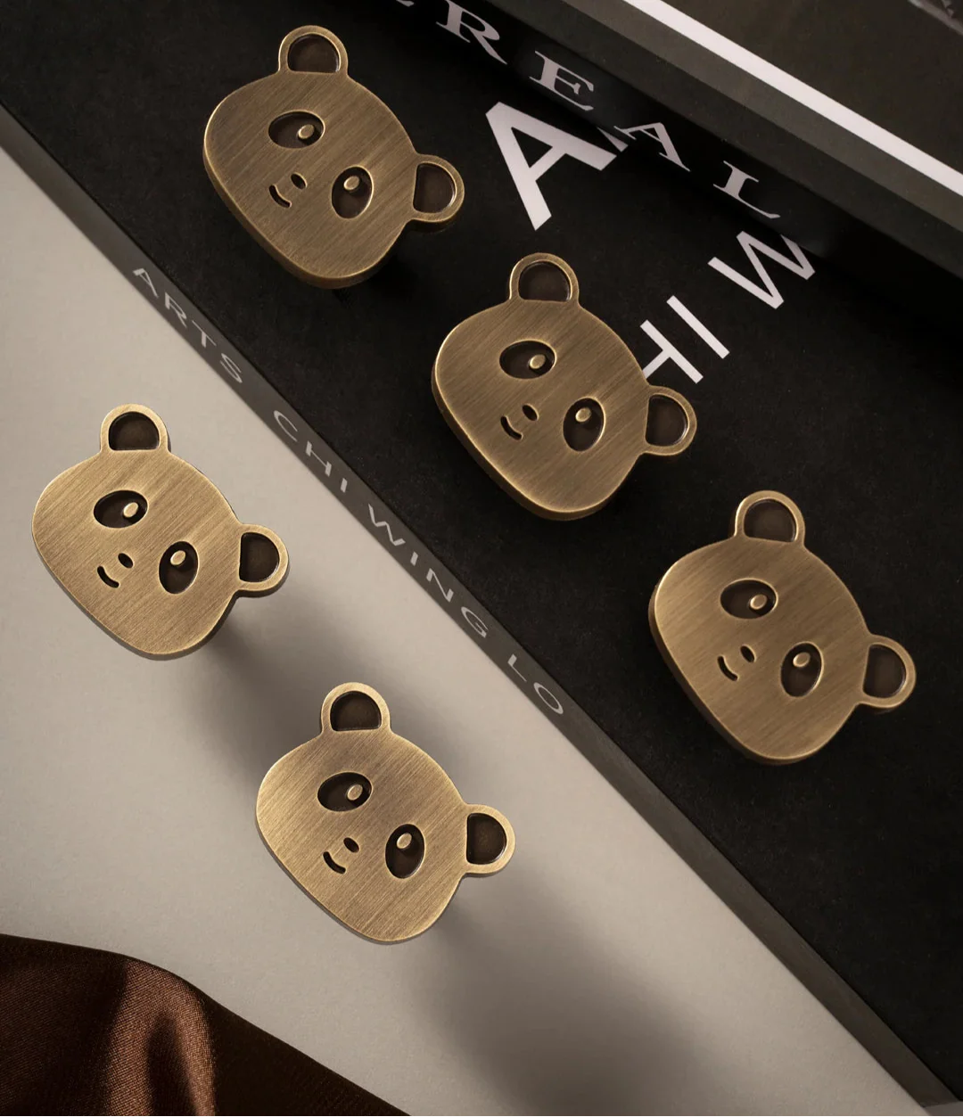 Bouton de meuble en forme de tête de panda en laiton