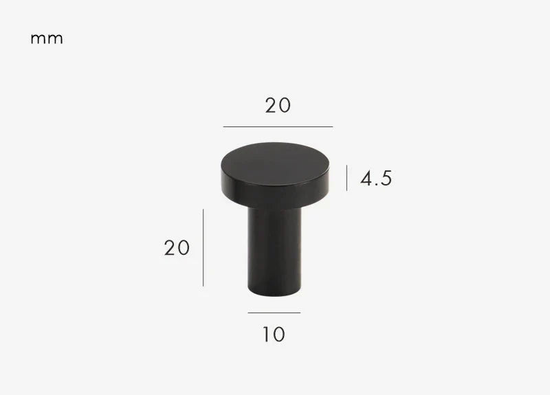Vue rapprochée d'un bouton de meuble noir élégant