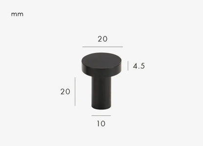 Vue rapprochée d'un bouton de meuble noir élégant