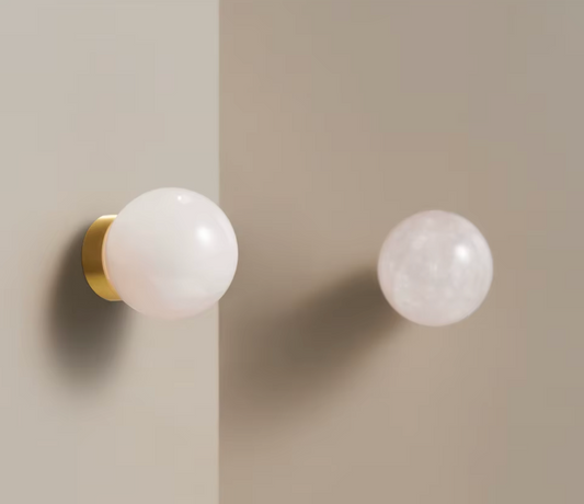 Gros plan sur le bouton effet perle rose