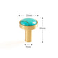 Vue rapprochée du bouton en laiton et pierre turquoise