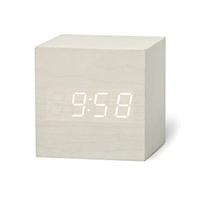 Réveil compact blanc avec design minimaliste
