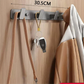Porte-manteau mural installé sur un mur blanc