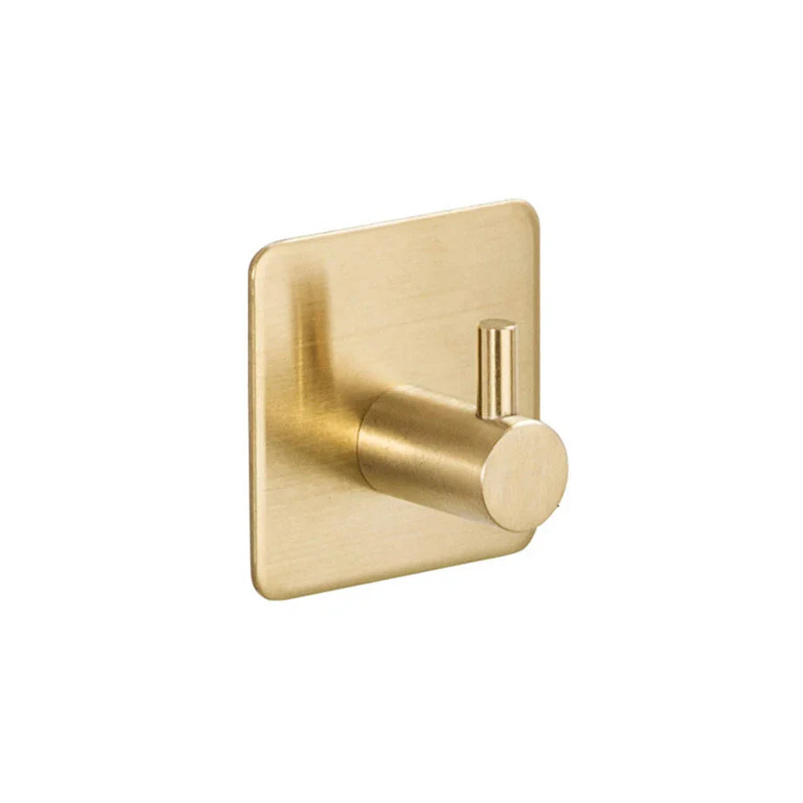 Porte serviette or brossé en aluminium sur fond blanc
