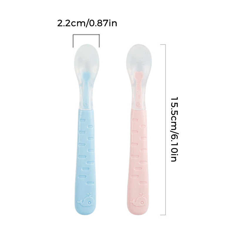 Cuillères en silicone bleu et rose pour nourrir les bébés
