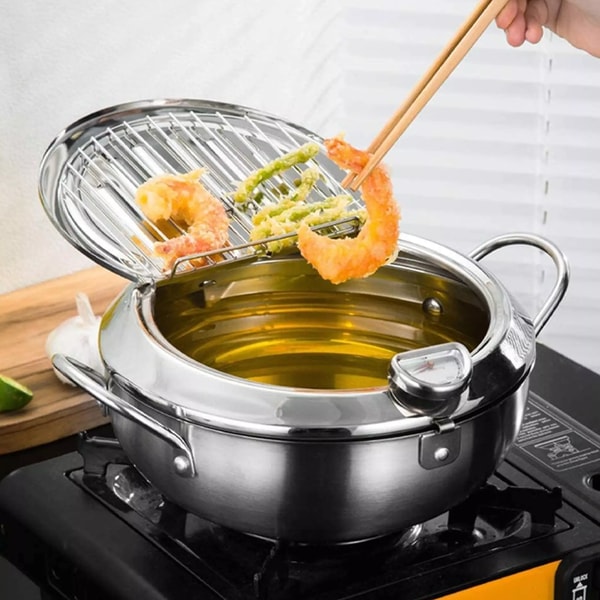 Couvercle de la friteuse avec système d'égouttage innovant