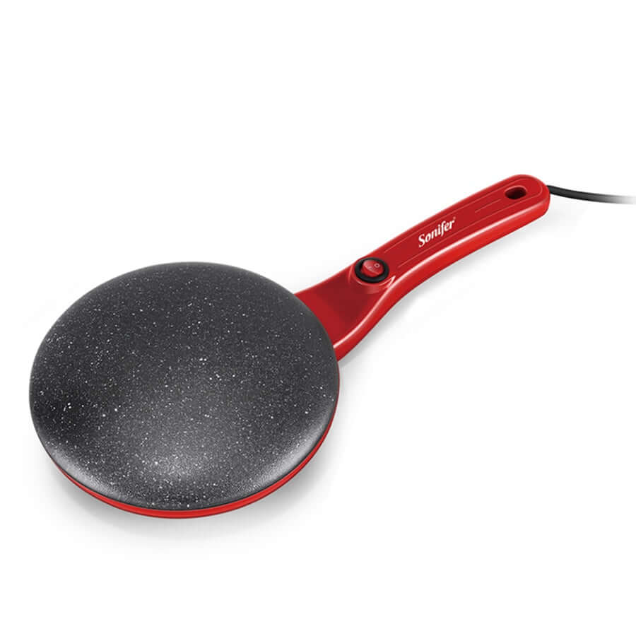 Crêpière en aluminium moulé sur un plan de travail