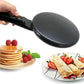 Crêpière électrique éteinte posée sur un comptoir propre