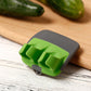 Éplucheur vert avec lame en acier inoxydable, vue latérale