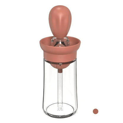 Bouteille en verre avec brosse intégrée, vue frontale