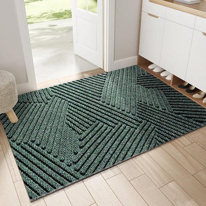 Tapis de porte vert, sécurisant l'entrée de la maison