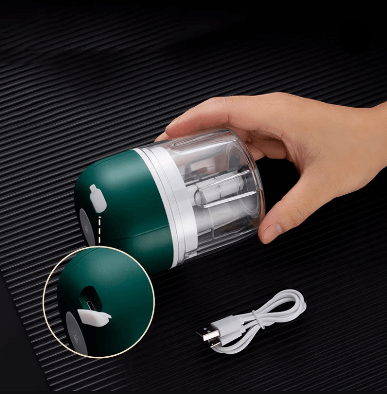 Presse-ail électrique vert vu de côté, compact et portable