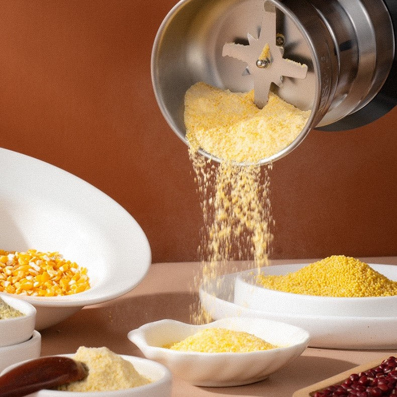 Vue latérale d'un moulin à aliments en acier inoxydable