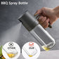 Spray d'huile en verre borosilicate sur fond blanc