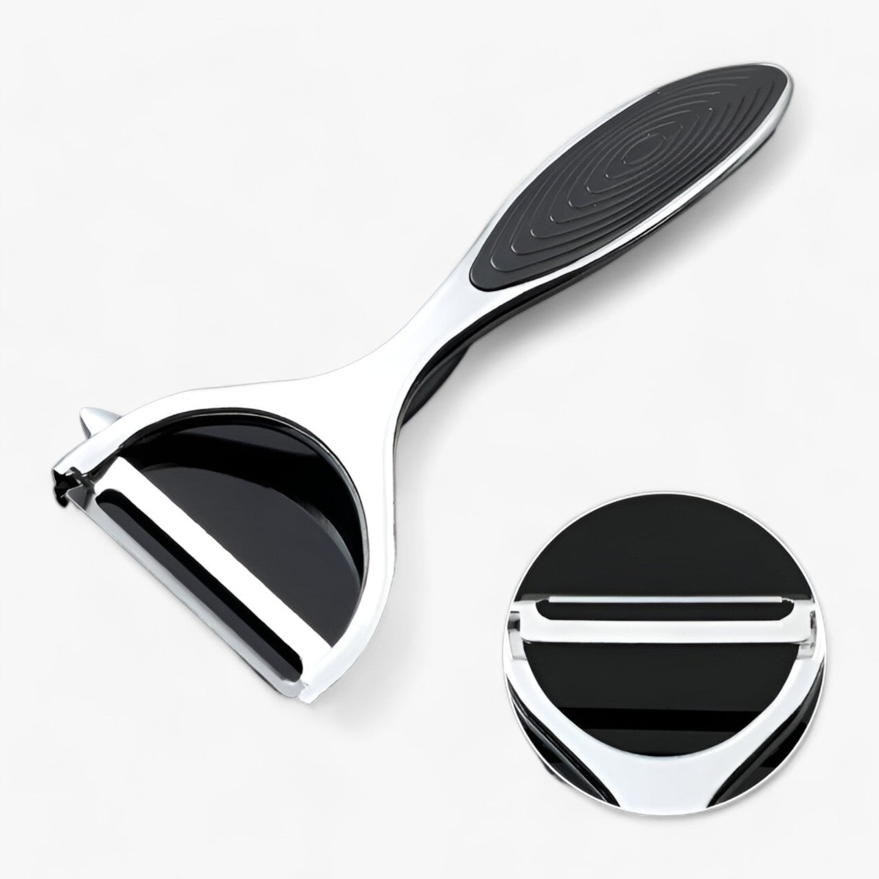 Gros plan sur la lame de l'éplucheur, acier brillant