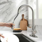 Robinet de cuisine avec bec haut rotatif et douchette extractible